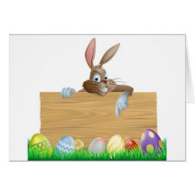 Pointage de caractère de lapin et oeufs de pâques carte de vœux