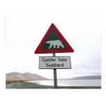 Polar bear crossing traffic sign post cards