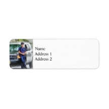 Policeman by Patrol Car Labels