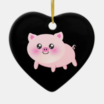 Porc rose mignon sur le noir ornements de noël