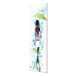 Portrait of young woman holding purse and umbrella gallery wrapped canvas
