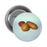 Potatoes on white background pinback buttons