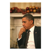 President Barack Obama reflects as he meets