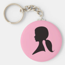 Profile of a woman with pony tail key chains