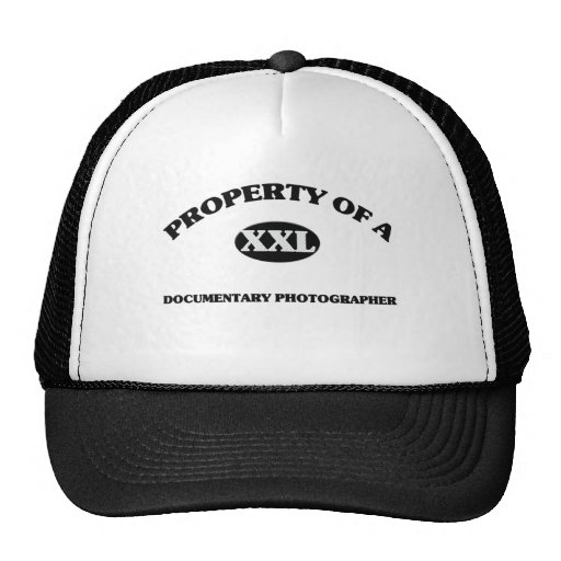 Property of a DOCUMENTARY PHOTOGRAPHER Trucker Hats
