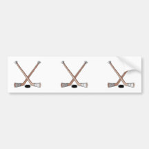 puck and hockey sticks design bumper sticker