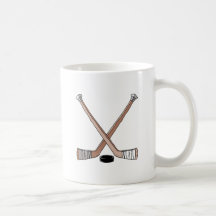 puck and hockey sticks design mug
