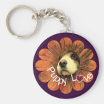 Puppy Love Peeking Out of a Flower keychains