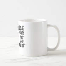 Raise your fist and resist mugs