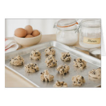 Raw cookies on baking tray greeting cards