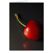 Red Cherry In Dark Greeting Cards