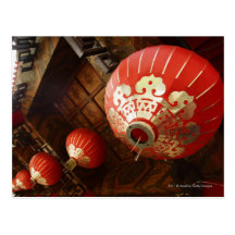 red lanterns hanging from temple roof postcard