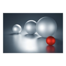 Red Metal Ball Next To Other Metal Balls Photograph