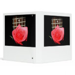 Red pink rose against five string bass fretboard vinyl binder