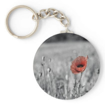 red poppy in a black and white field key chains