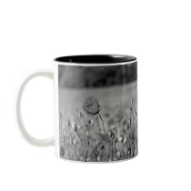red poppy in a black and white field coffee mugs