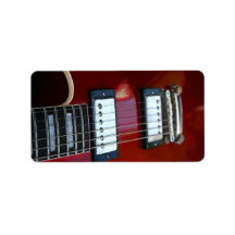 Red semi hollow guitar picture of strings, pickups custom address label