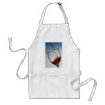 Red wine poured into wine glass aprons