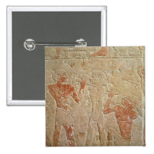 Relief depicting two sculptors carving a button