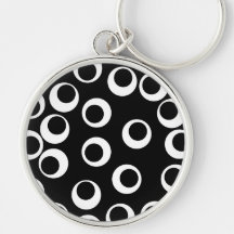 Rétro conception noire et blanche à la mode. Coutu Porte-clé