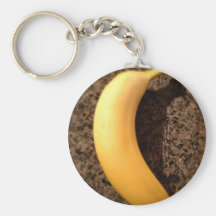 Ripe yellow banana on granite key chains