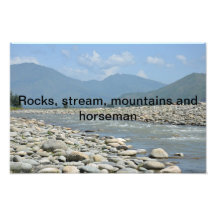 Riverbank water rocks mountains and a horseman photographic print