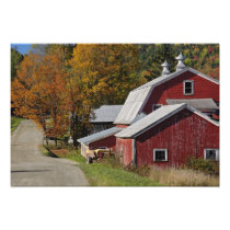 Road beside classic rural barn/farm in autumn,