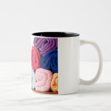 Rolls of colourful microfiber towels coffee mugs