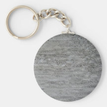 Rough grey concrete wall texture with relief lines keychains