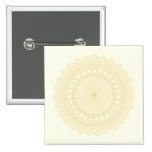 Round motif in cream colour. pinback button