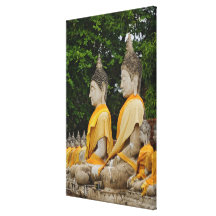 Row of Buddha statues, Wat Yai Chaya Mongkol Canvas Print