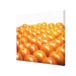 Row of oranges stretched canvas prints