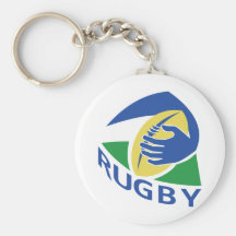 rugby ball hand holding keychains