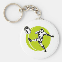 rugby player kicking ball woodcut key chains