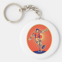 rugby player kicking ball woodcut keychains