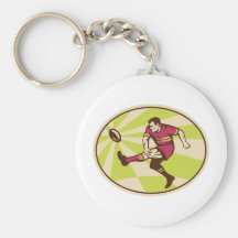 Rugby player kicking the ball retro keychain