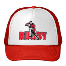 Rugby player running fending ball hat
