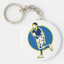 rugby player running passing ball retro style keychain