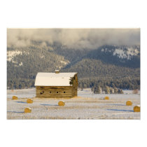 Rustic barn and hay bales after a fresh snow 2