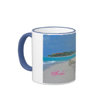 Sable d'Aruba et tasse de surf