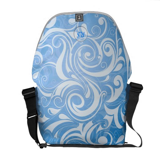 Sac messenger au motif 12 besaces