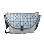 Sac messenger - motif de marguerite dans bleu-clai sacs messenger