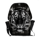Sacs messenger noirs et blancs à cru de tigre besaces