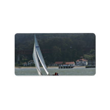 Sailboat in harbour against green mountain custom address label