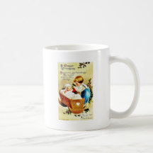 Salutation de Noël avec un enfant dans un caddle e Tasse À Café