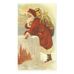 Santa Claus Climbing Down the Chimney with Toys Business Card