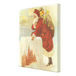 Santa Claus Climbing Down the Chimney with Toys Gallery Wrap Canvas