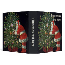 Santa Claus Lighting Candles on the Christmas Tree