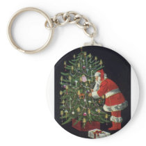 Santa Claus Lighting Candles on the Christmas Tree Keychains
