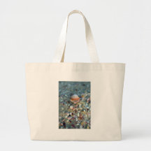 Sea shells on sandy beach tote bags